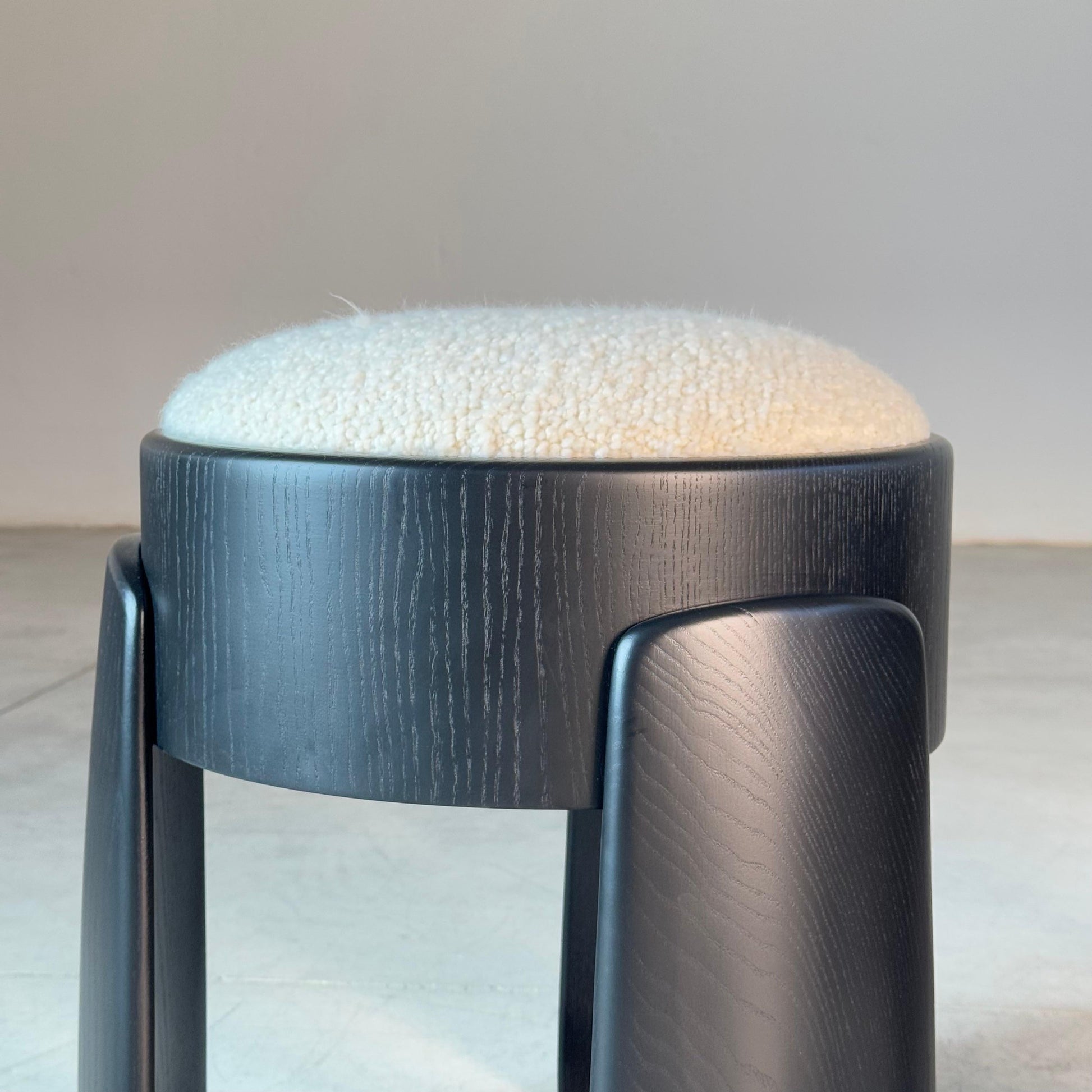 Sculptural Pair of Black Ash Wood Stools with Dedar Milano Boucle Ivory by FORME Stools