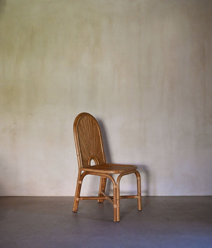 woven rattan chair, a single chair, three-quarter view