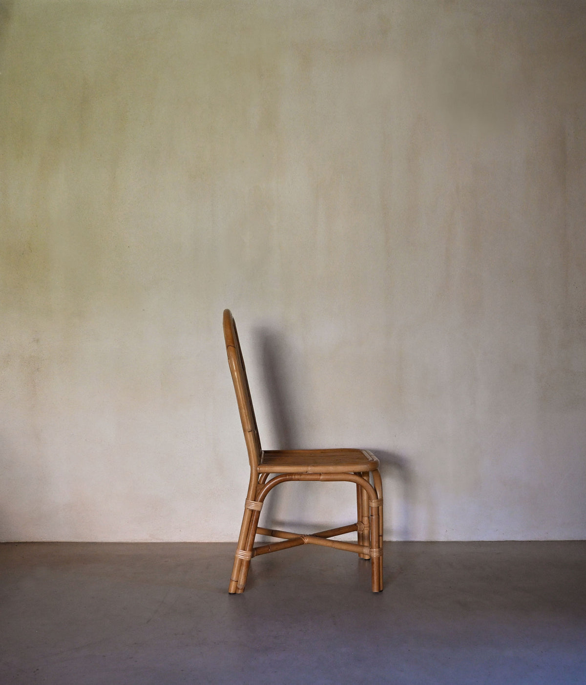 woven rattan chair, a single chair in profile