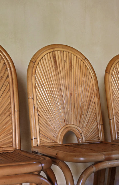 woven rattan chair, the fanned backrests of several chairs together