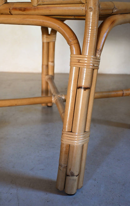 woven rattan chair, detail of a bound rattan leg and stretcher