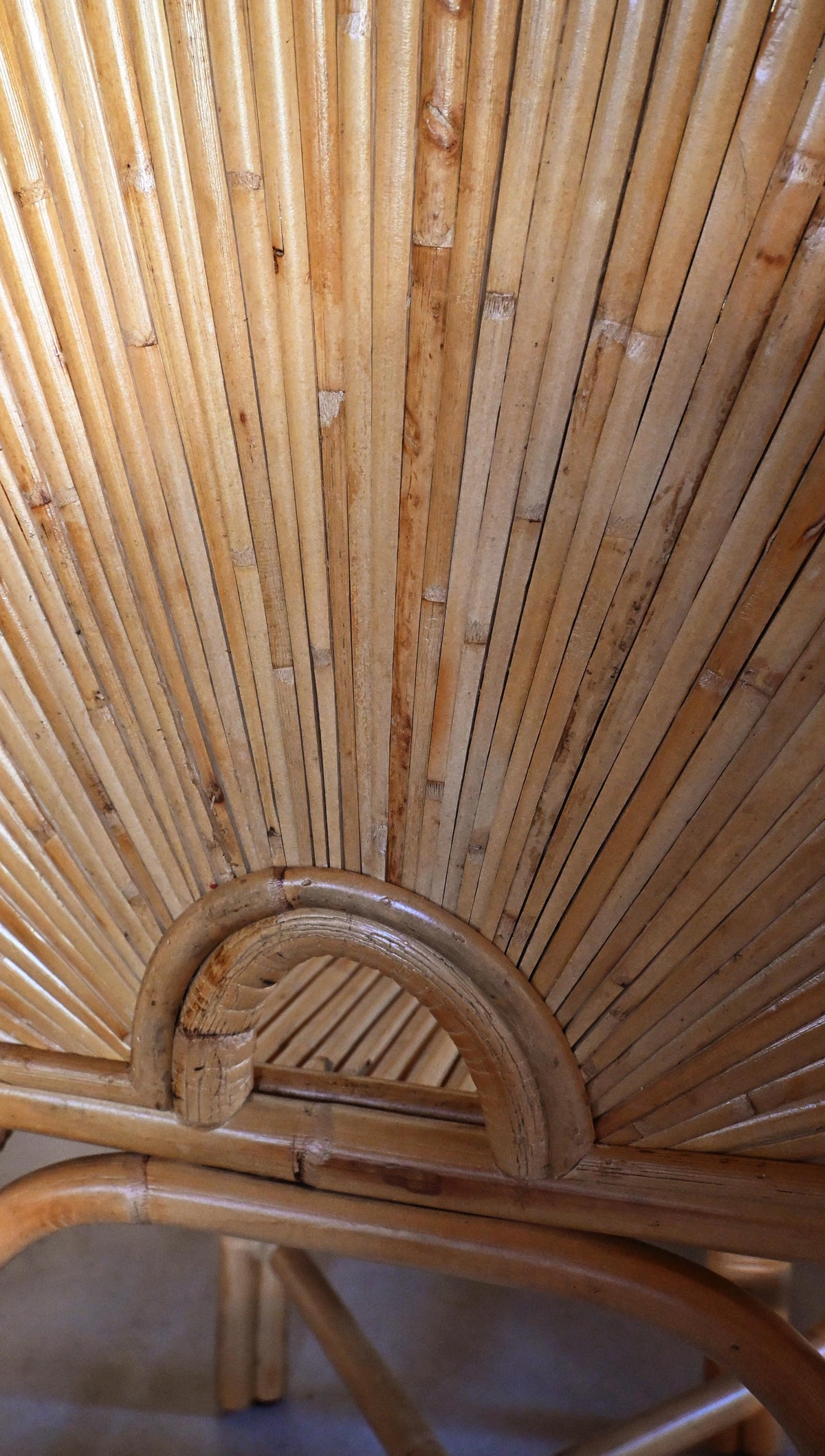 woven rattan chair, detail of the fanned rattan backrest