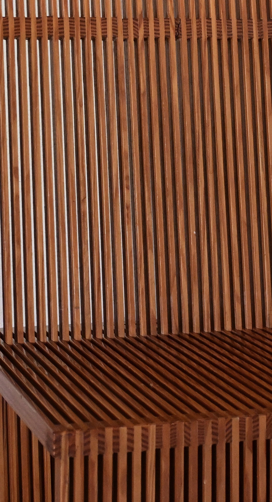 Brutalist wood Strips occasional chair, detail of the slatted back and seat together