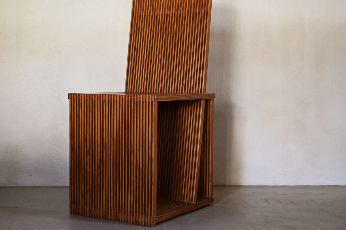 Brutalist wood Strips occasional chair, three-quarter view, horizontal format