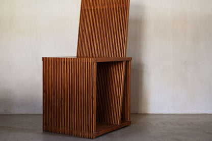 Brutalist wood Strips occasional chair, three-quarter view, horizontal format