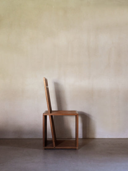 Brutalist wood Strips occasional chair, front view with the tall backrest