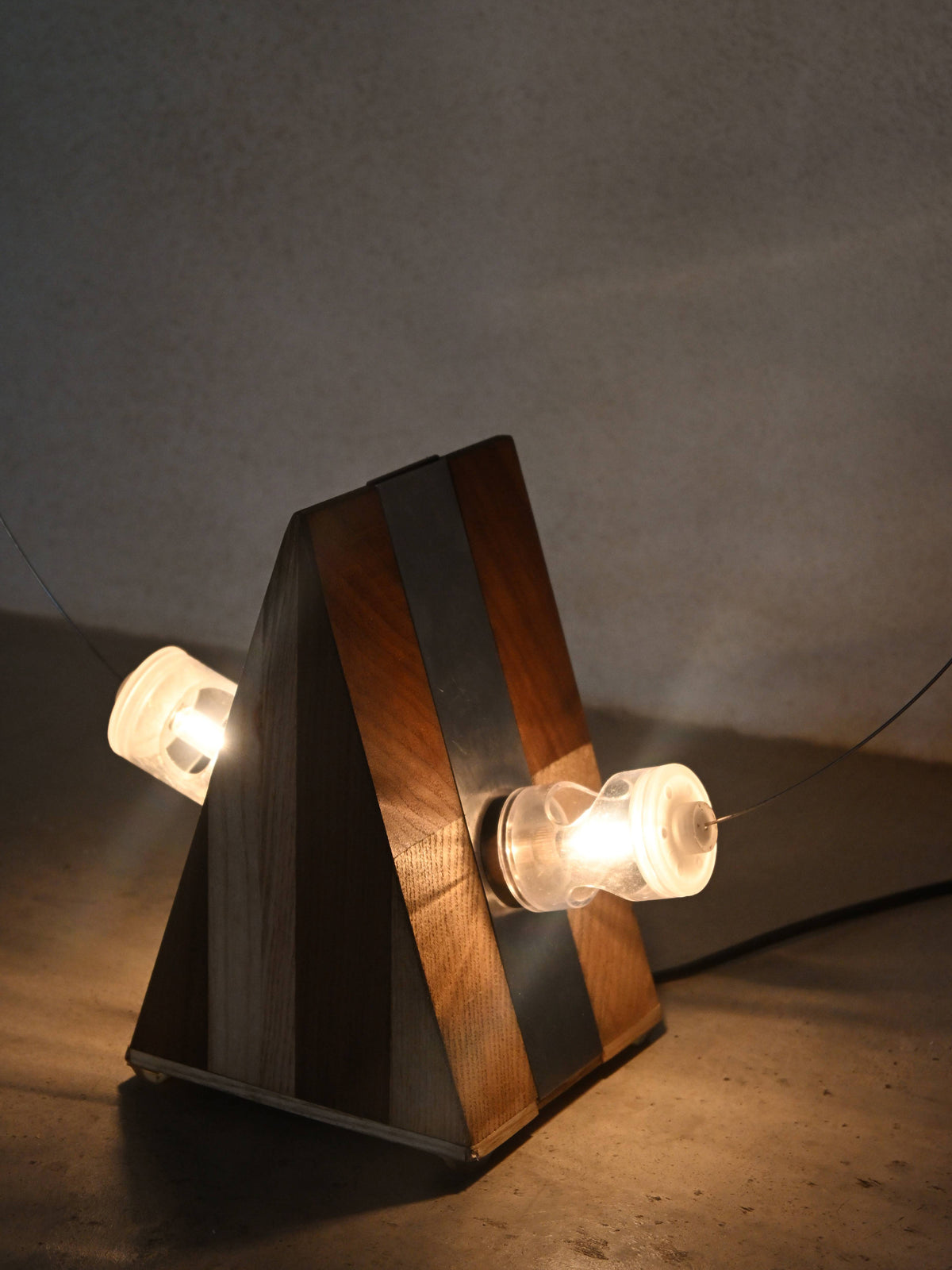 Studio A.R.D.I.T.I. "BT1972" lamp, close view lit, showing both bulbs held in place