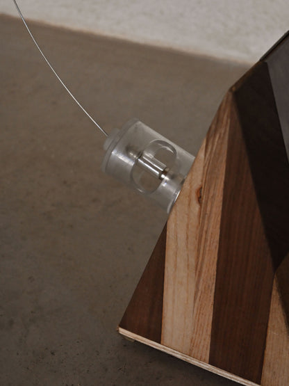 Studio A.R.D.I.T.I. "BT1972" lamp, detail of the bulb held to the body by magnet