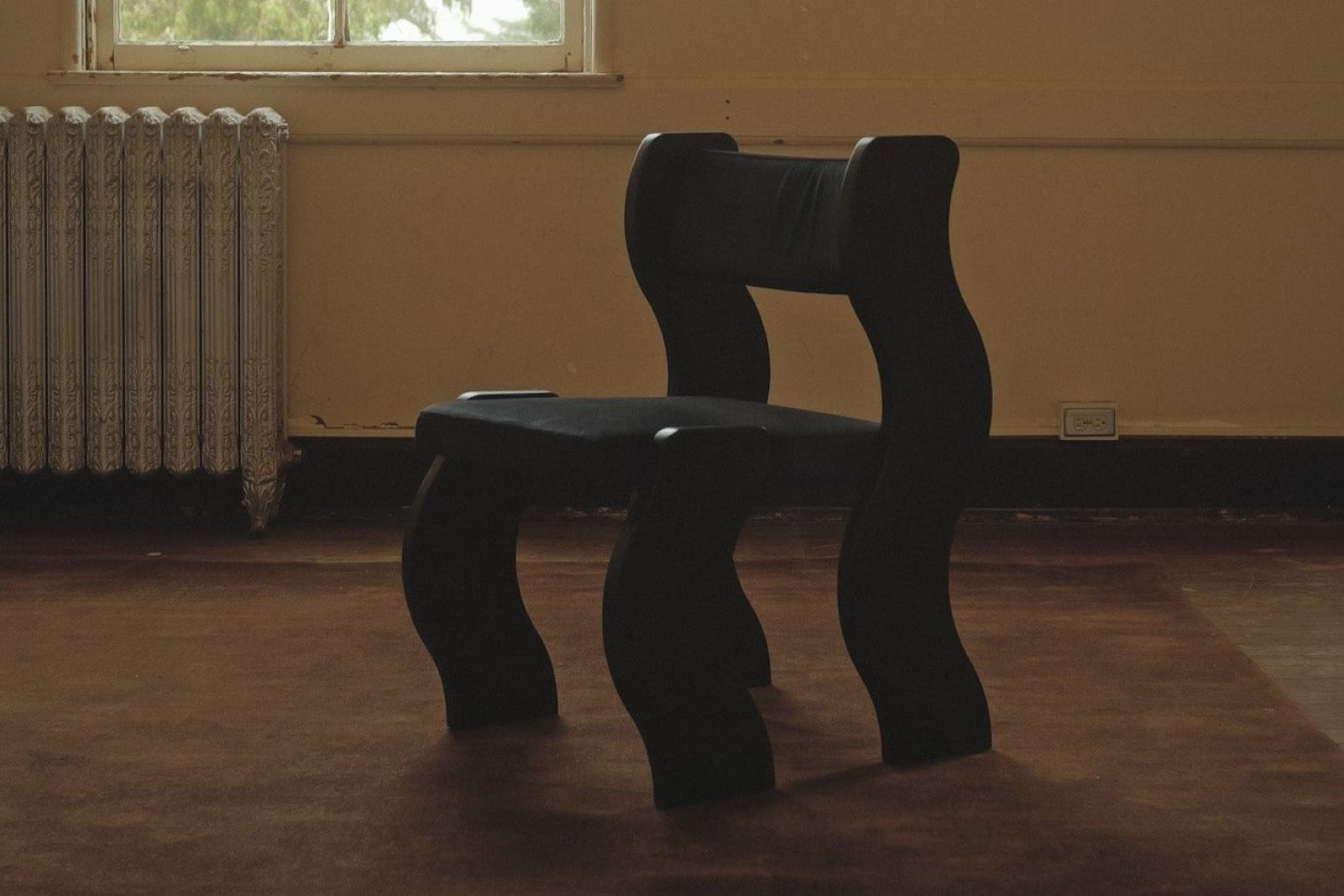 Wave Chair in Black by Sun at Six Chairs