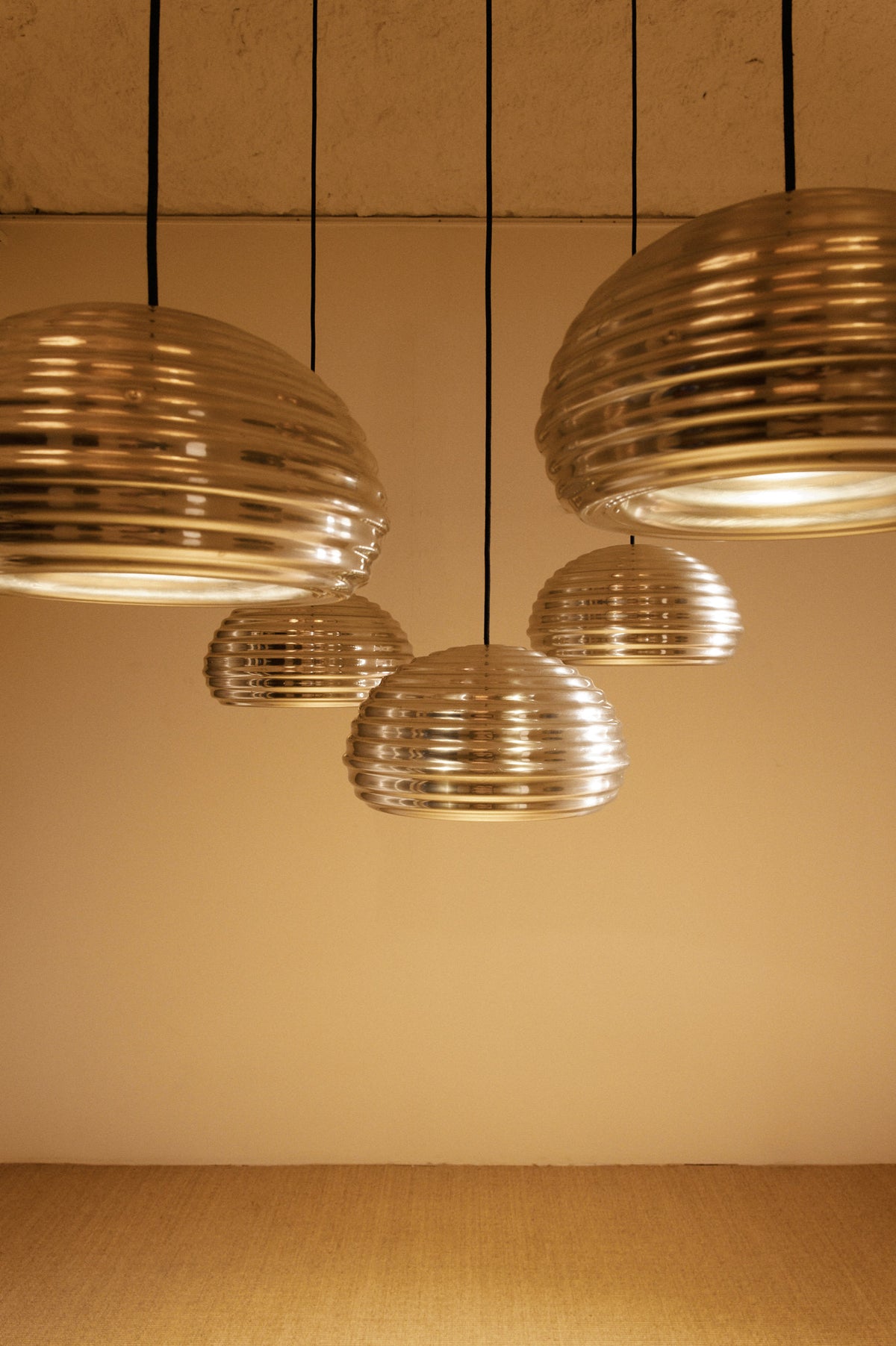 Achille Castiglioni Splugen Brau pendant lights, nearer view of the five pendants