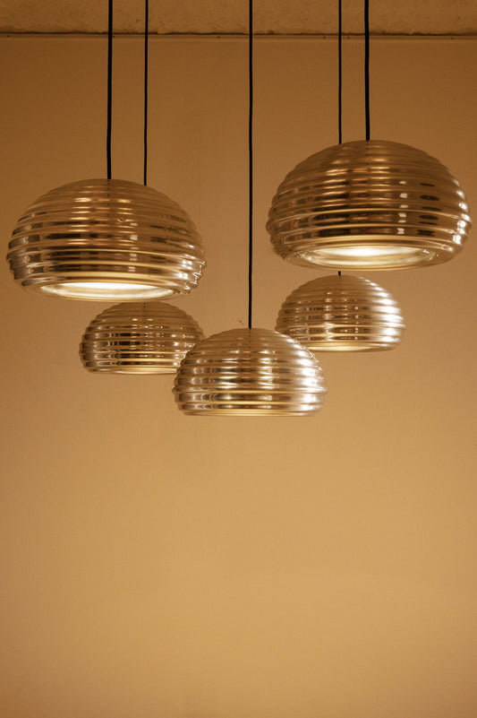 Achille Castiglioni Splugen Brau pendant lights, all five pendants hanging together