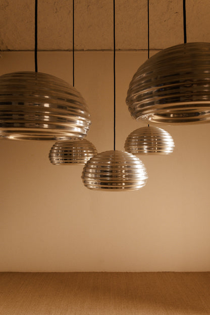 Achille Castiglioni Splugen Brau pendant lights, wide view of the five pendants