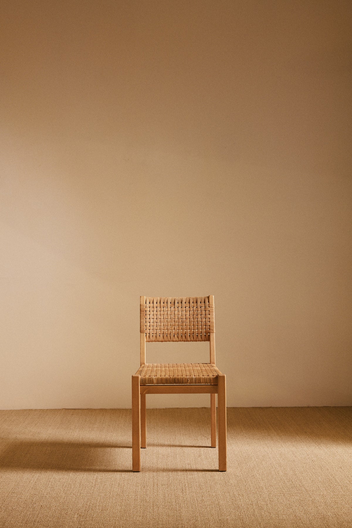 Aino Aalto birch and woven rattan 615 chairs, single chair from the front