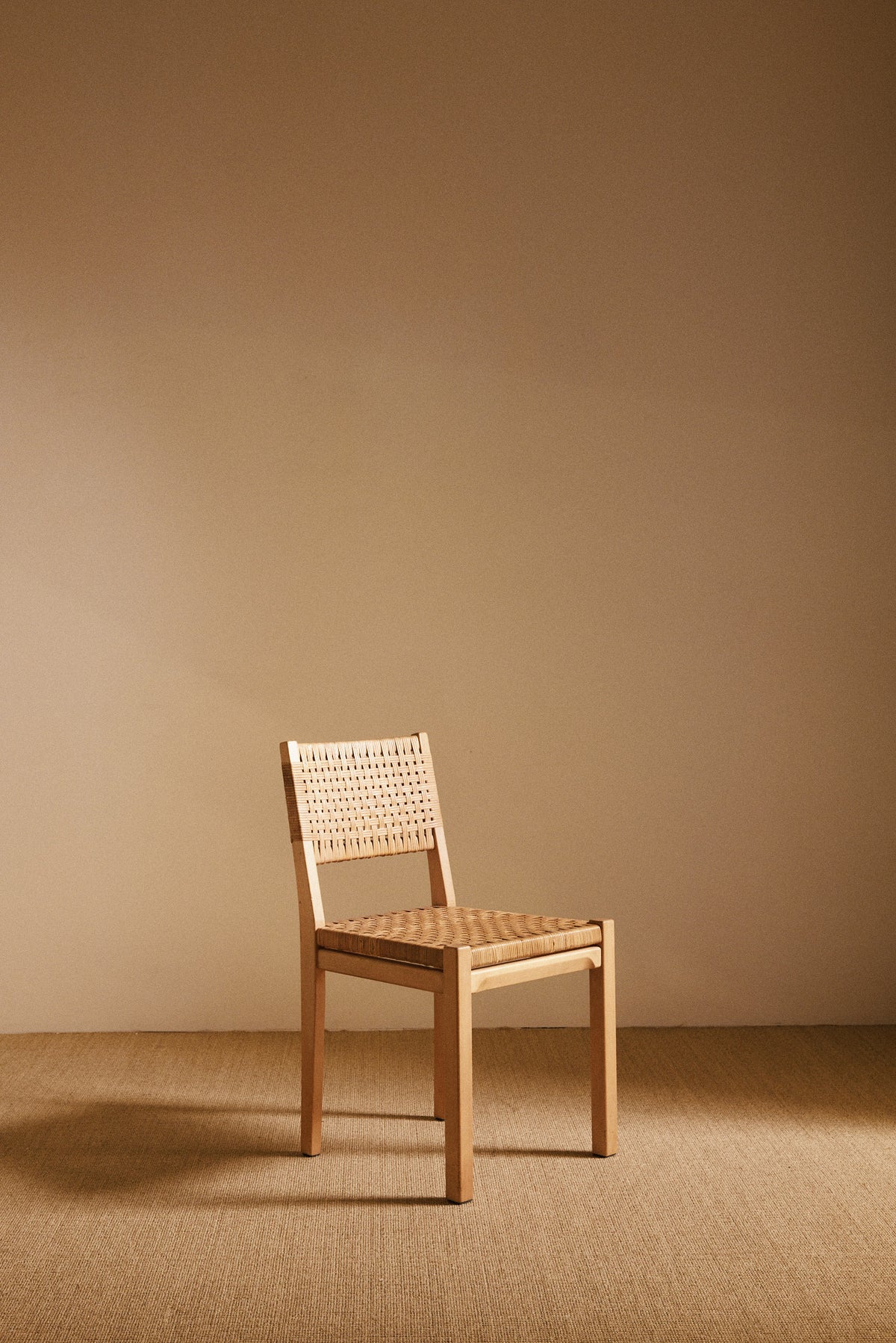 Aino Aalto birch and woven rattan 615 chairs, single chair, three quarter front view