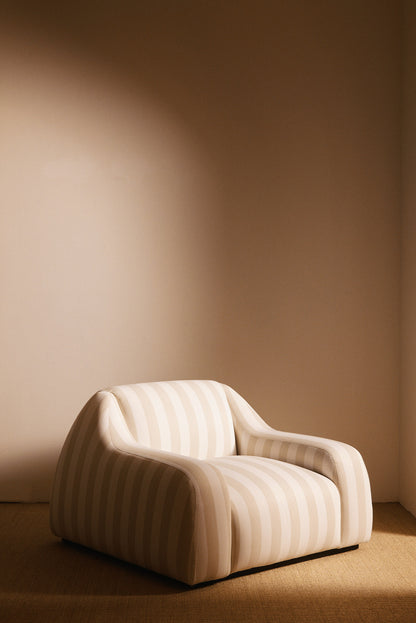 AS02 armchair in Jim Thomson Matelot Sea Shell fabric, angled view of the striped armchair