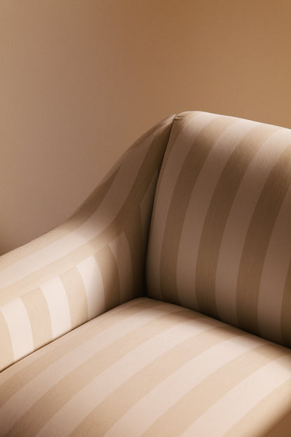 AS02 armchair in Jim Thomson Matelot Sea Shell fabric, close view of the rolled arm and seat