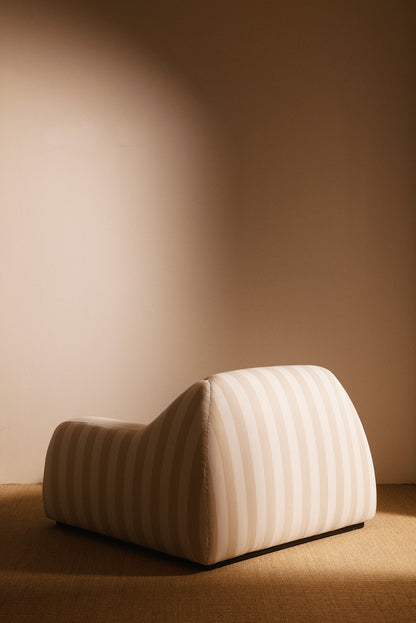 AS02 armchair in Jim Thomson Matelot Sea Shell fabric, angled view of the back