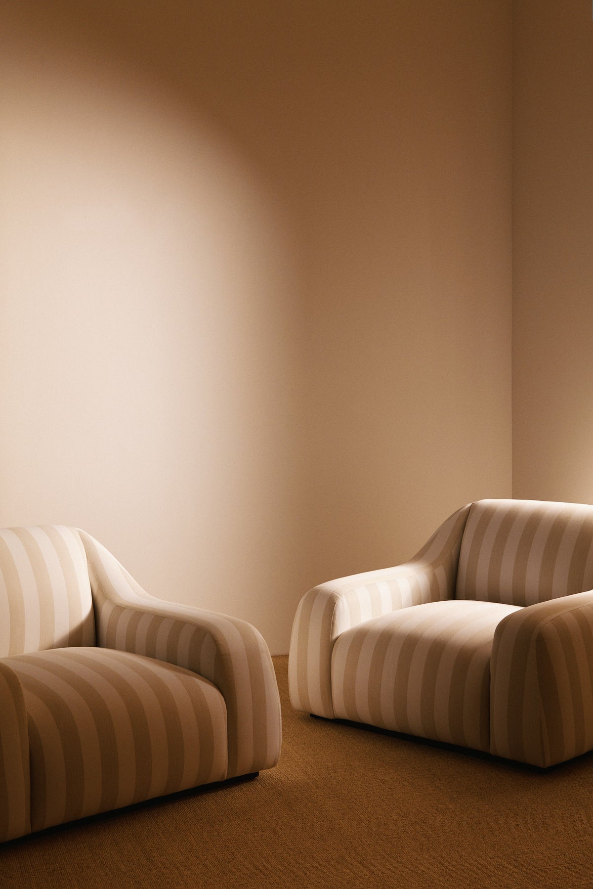 AS02 armchair in Jim Thomson Matelot Sea Shell fabric, two armchairs side by side