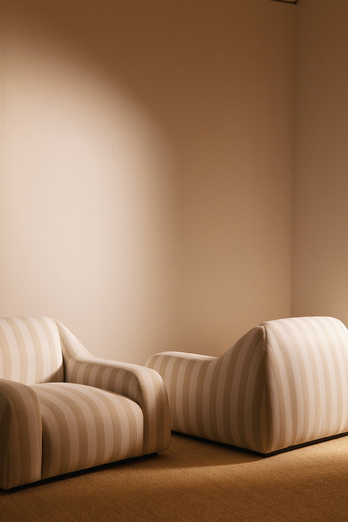 AS02 armchair in Jim Thomson Matelot Sea Shell fabric, two armchairs, one from the front and one from the back