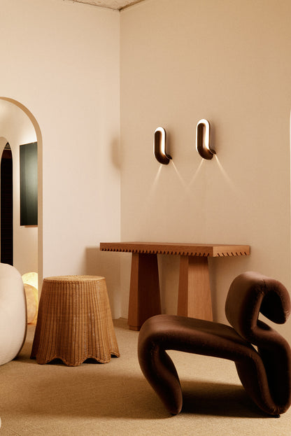 Baga oak console table, view in a room with an arch and a chair