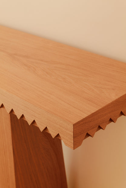 Baga oak console table, close angled view of the top and a leg