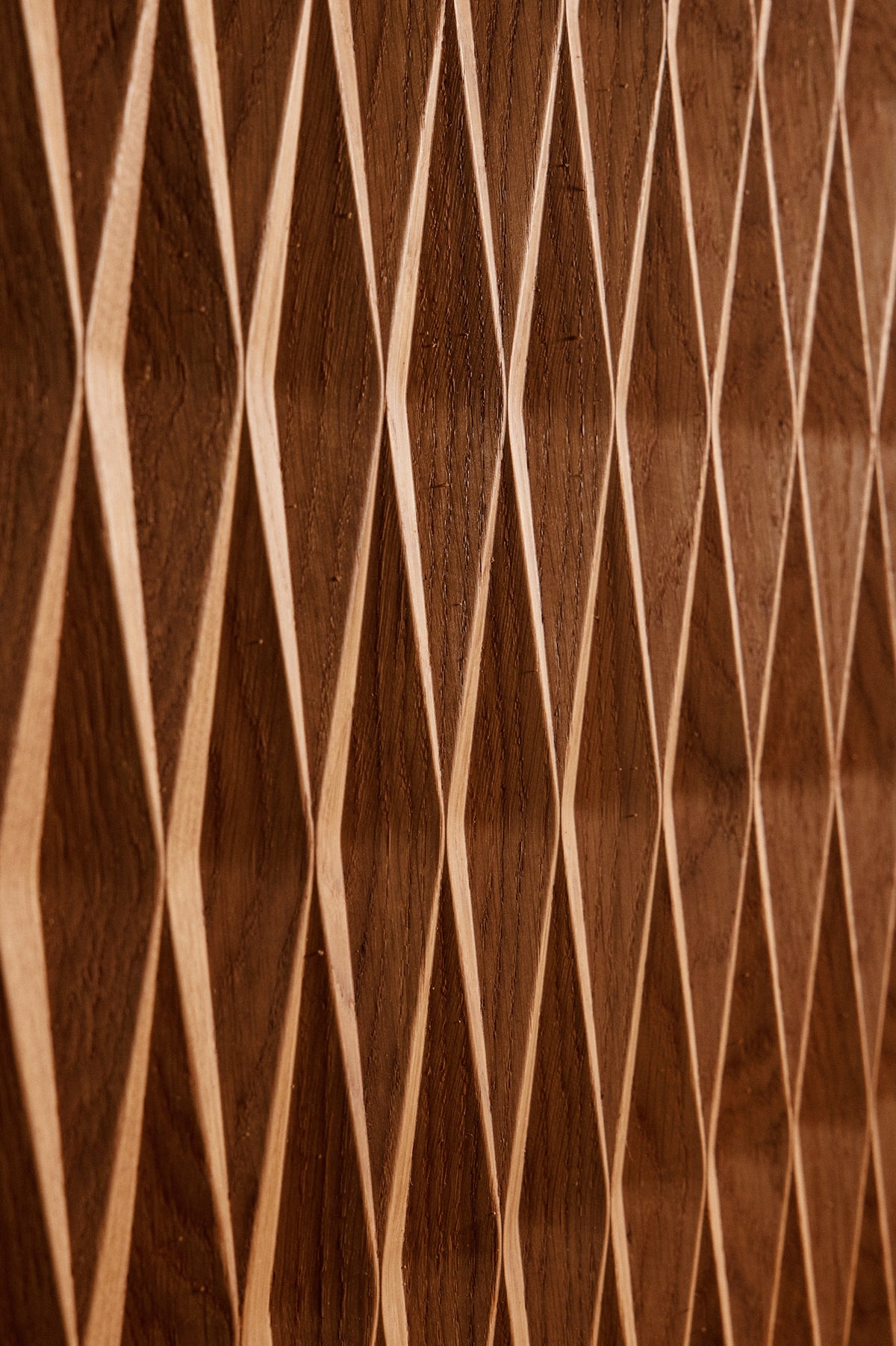 Cabinet 01 in solid oak, close view of the diamond relief on a door