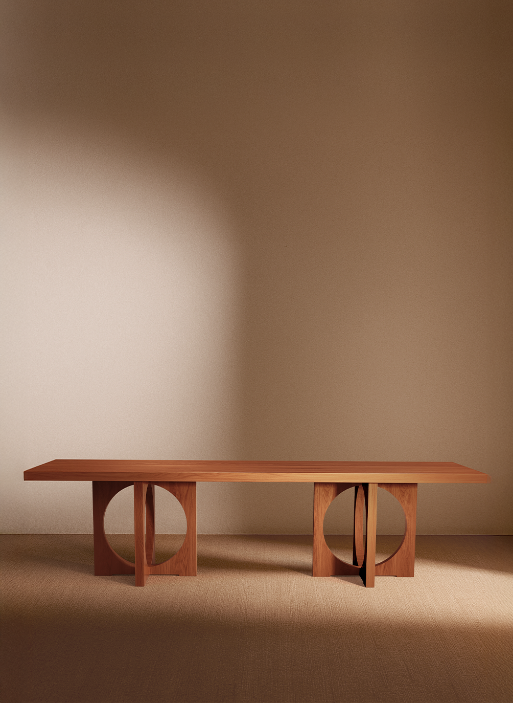 Moon dining table in solid oiled oak, front view of the two legged table in the room