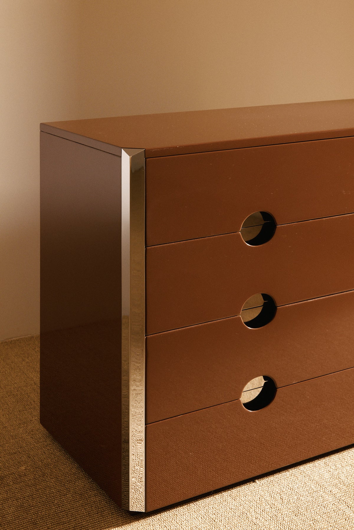 Luigi Caccia Dominioni MB3 commode in wood and metal, angled view of the drawer fronts