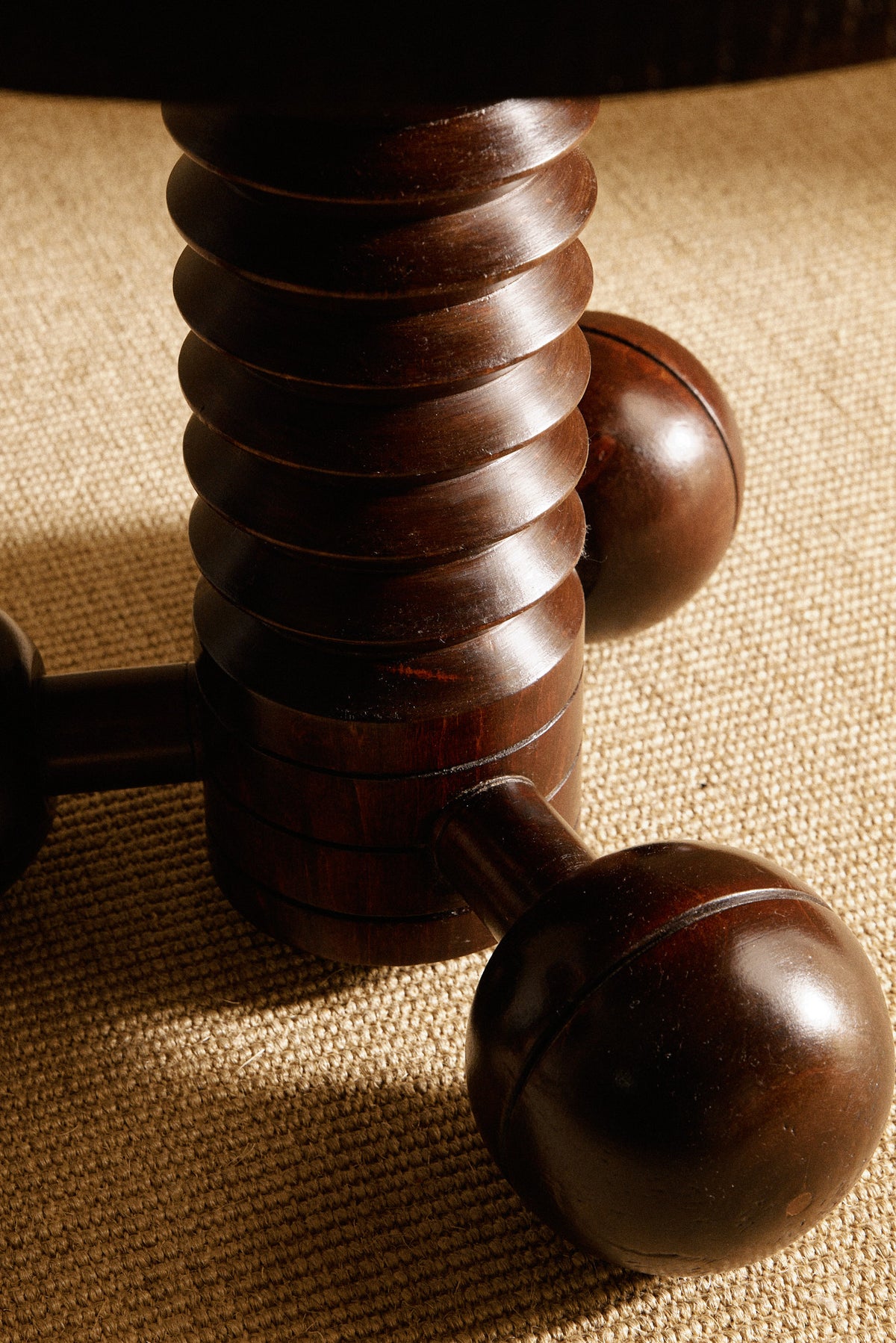 Charles Dudouyt patinated solid oak side table, close view of the ribbed column and a ball foot