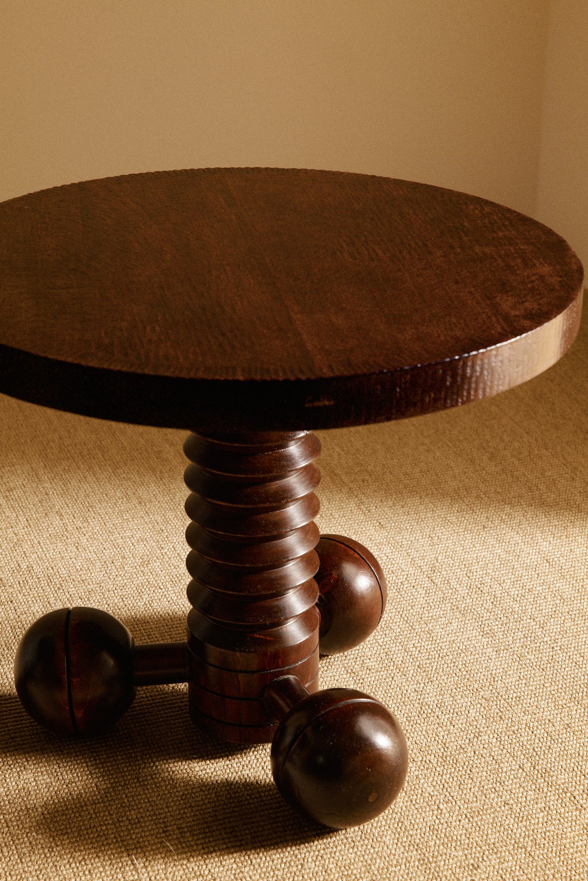 Charles Dudouyt patinated solid oak side table, full view of the round top, column and ball feet