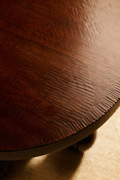 Charles Dudouyt patinated solid oak side table, close view of the textured top surface