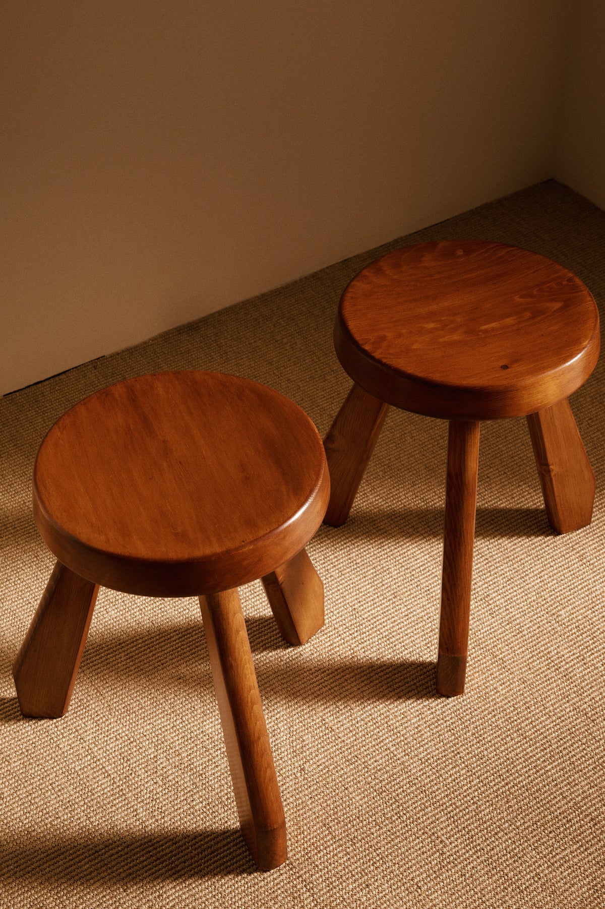 Charlotte Perriand pine Sandoz stools, pair seen from above
