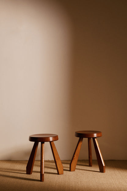 Charlotte Perriand pine Sandoz stools, wide view of the pair