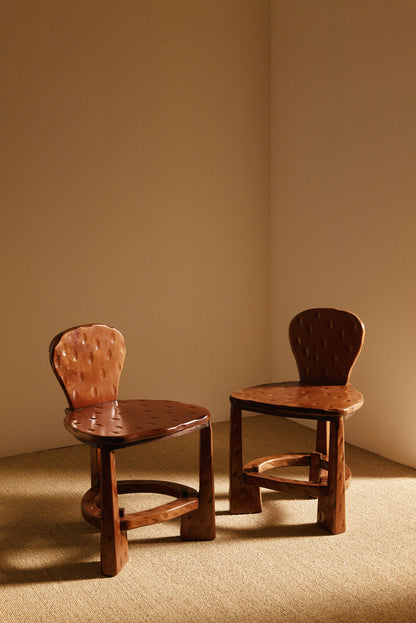 Pair of Dutch wood tripod chairs view of the pair