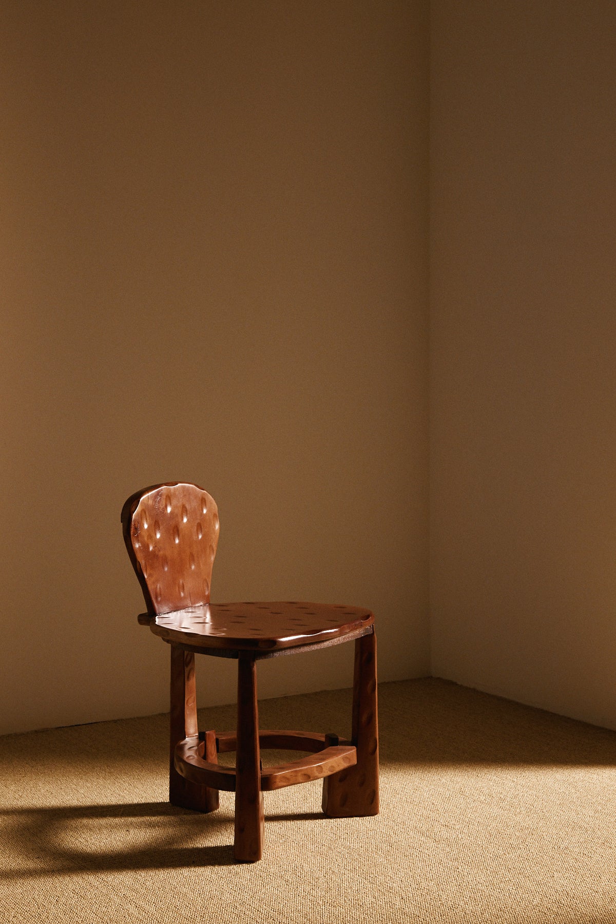 Pair of Dutch wood tripod chairs, single chair, closer front view