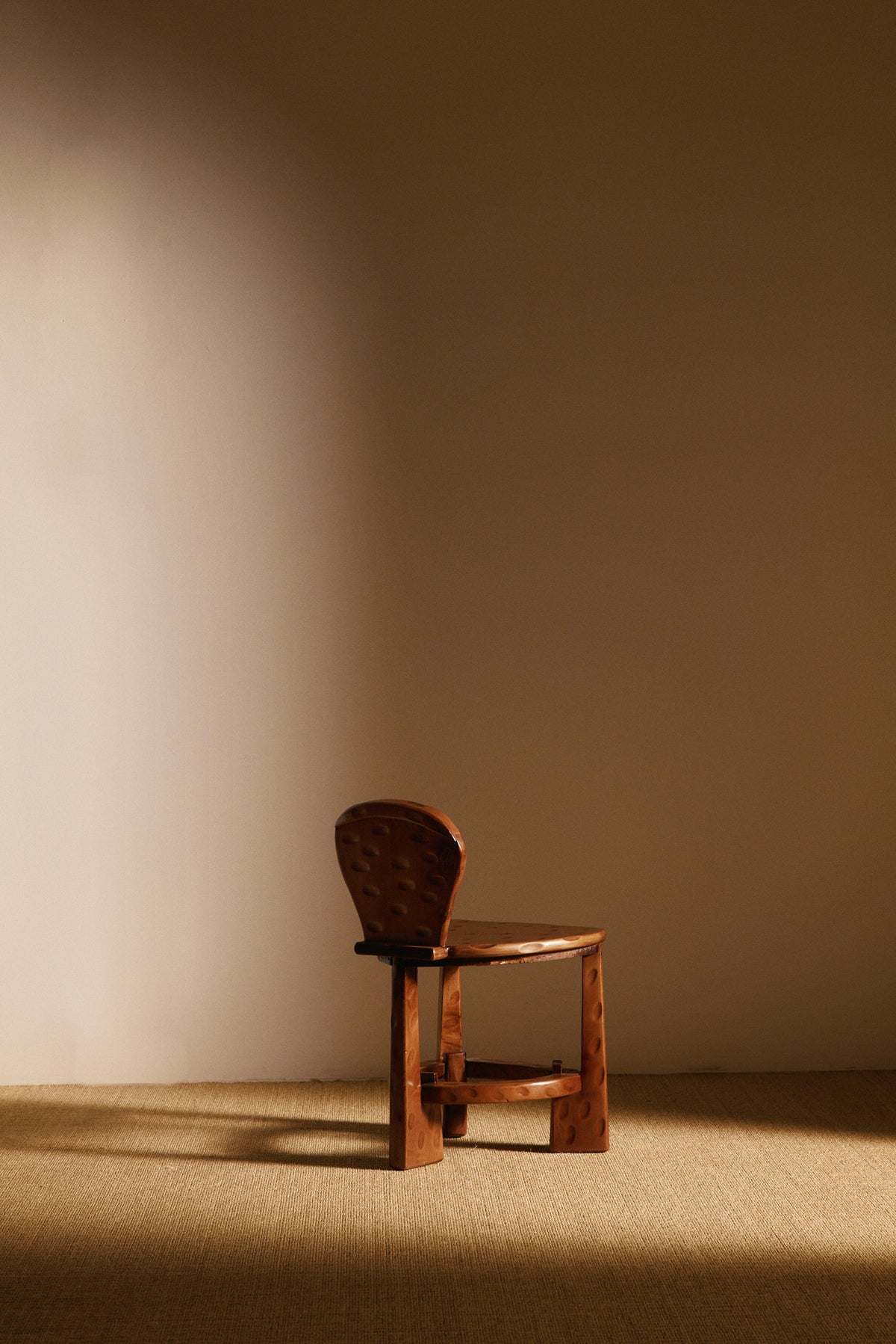 Pair of Dutch wood tripod chairs, single chair, rear view
