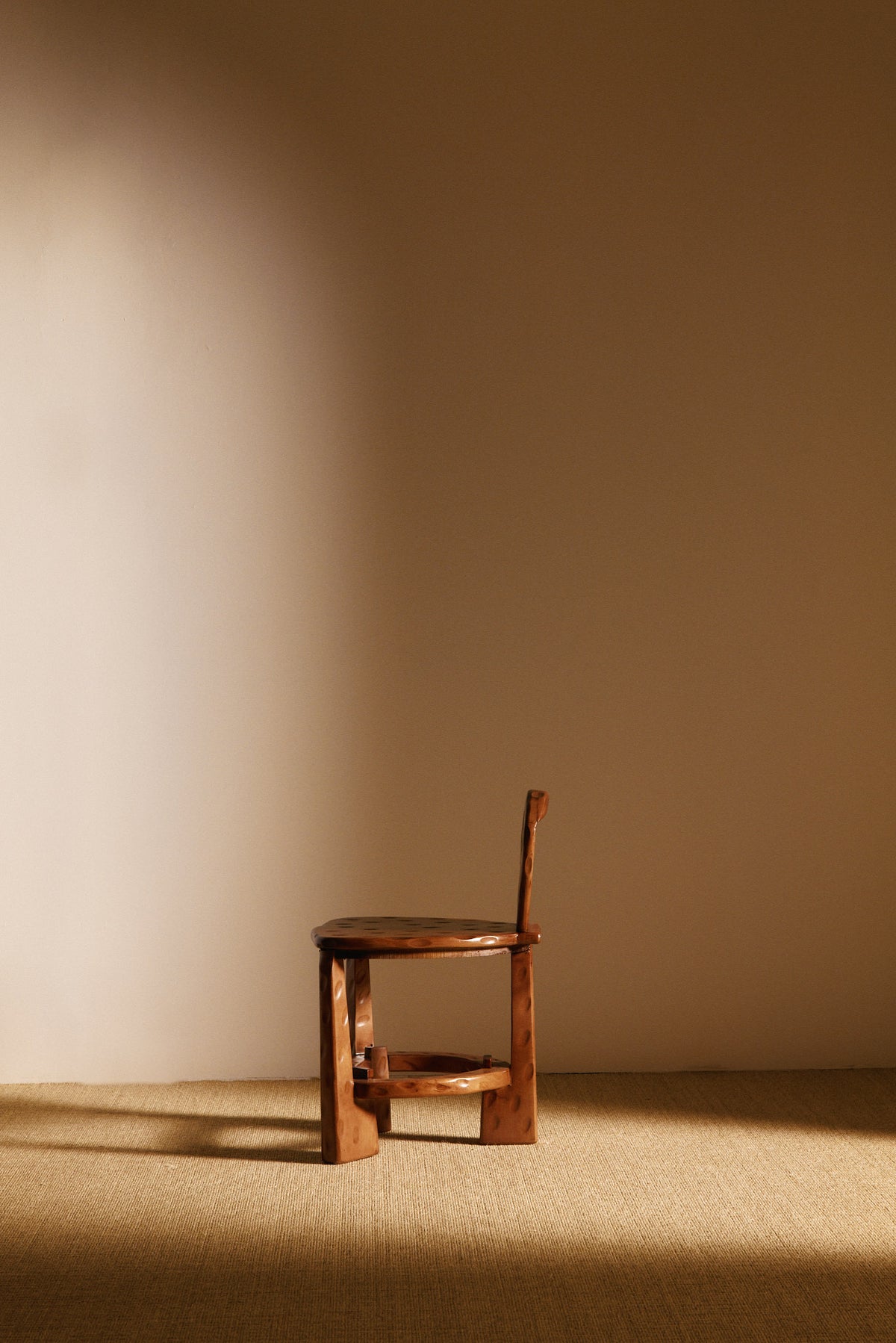 Pair of Dutch wood tripod chairs, single chair, side profile facing left