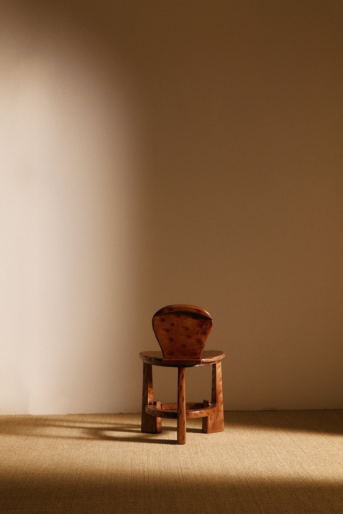Pair of Dutch wood tripod chairs, single chair, side view