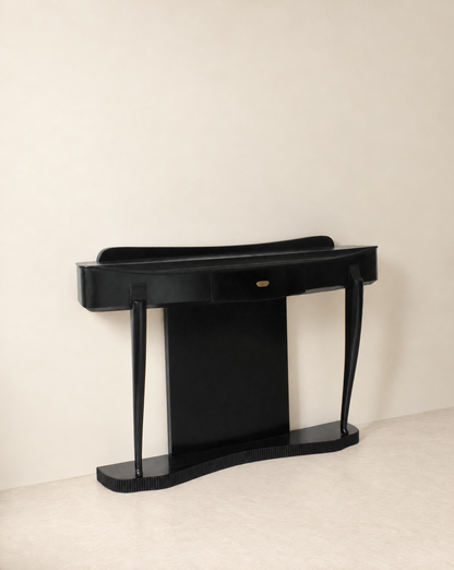 Ebonised console table at an angle showing the curved top and slender legs