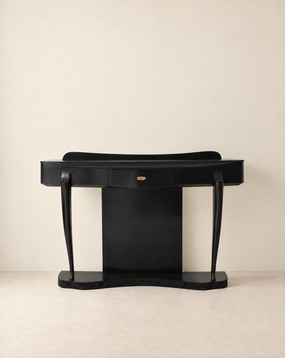 Ebonised Italian console table seen straight on against a pale wall