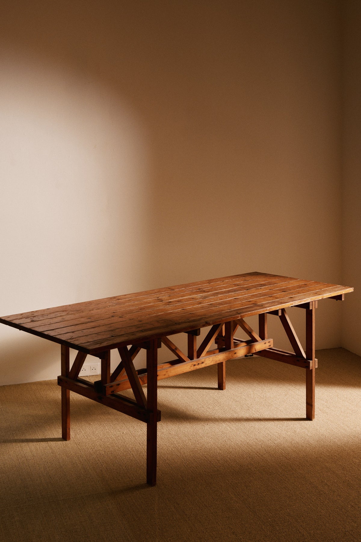 Enzo Mari natural pine Autoprogettazione dining table, angled view of the board top and braced frame