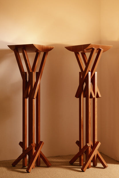 Frank Gehry patinated pine floor lamp, two lamps side by side against the wall