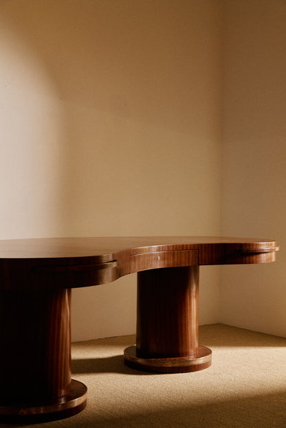 French Art Deco brass and rosewood desk view of the two pedestal bases