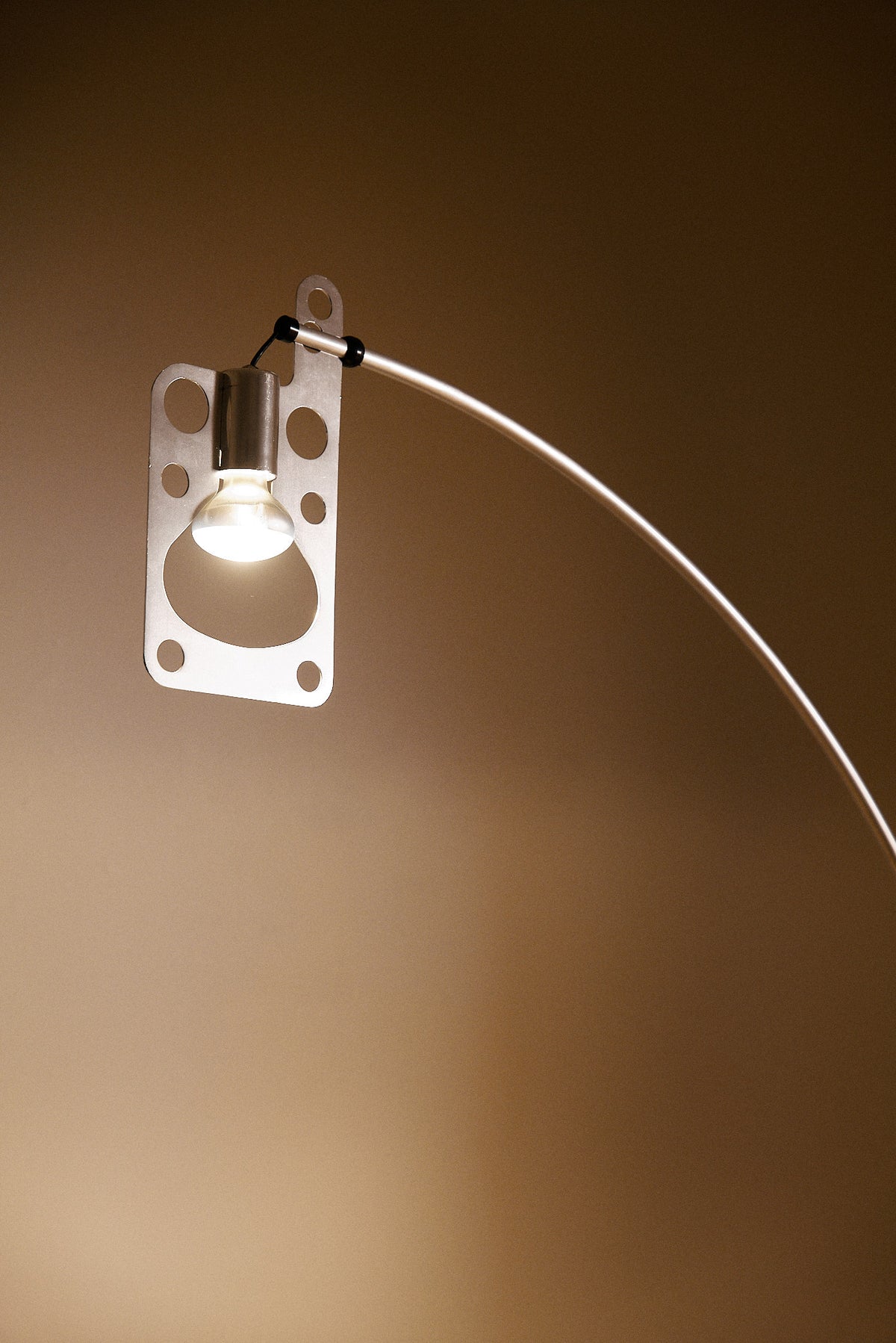 Gabetti & Isola leather and metal floor lamp, pierced plate and bulb at the end of the arm