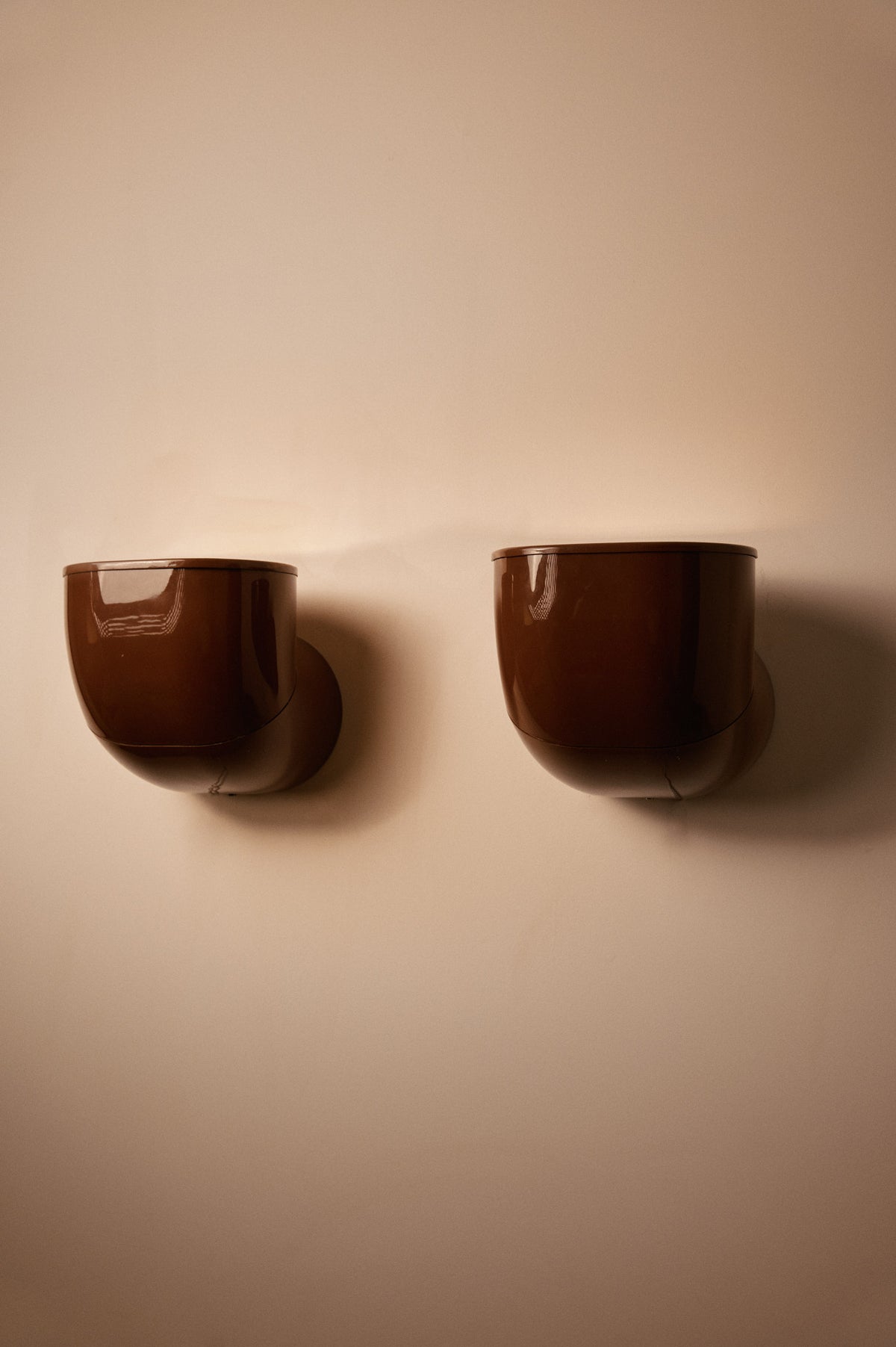 Gae Aulenti Gomito sconces, pair on the wall, angled view