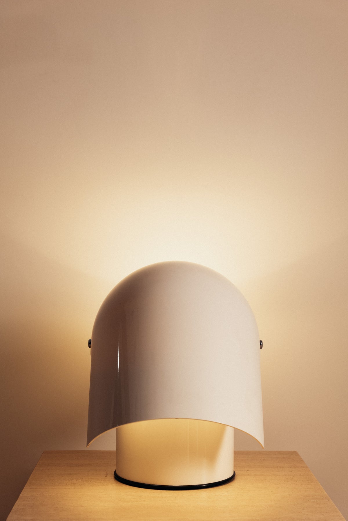 Gae Aulenti molded ABS Mezzo Pileo table lamp, hood closed, front view