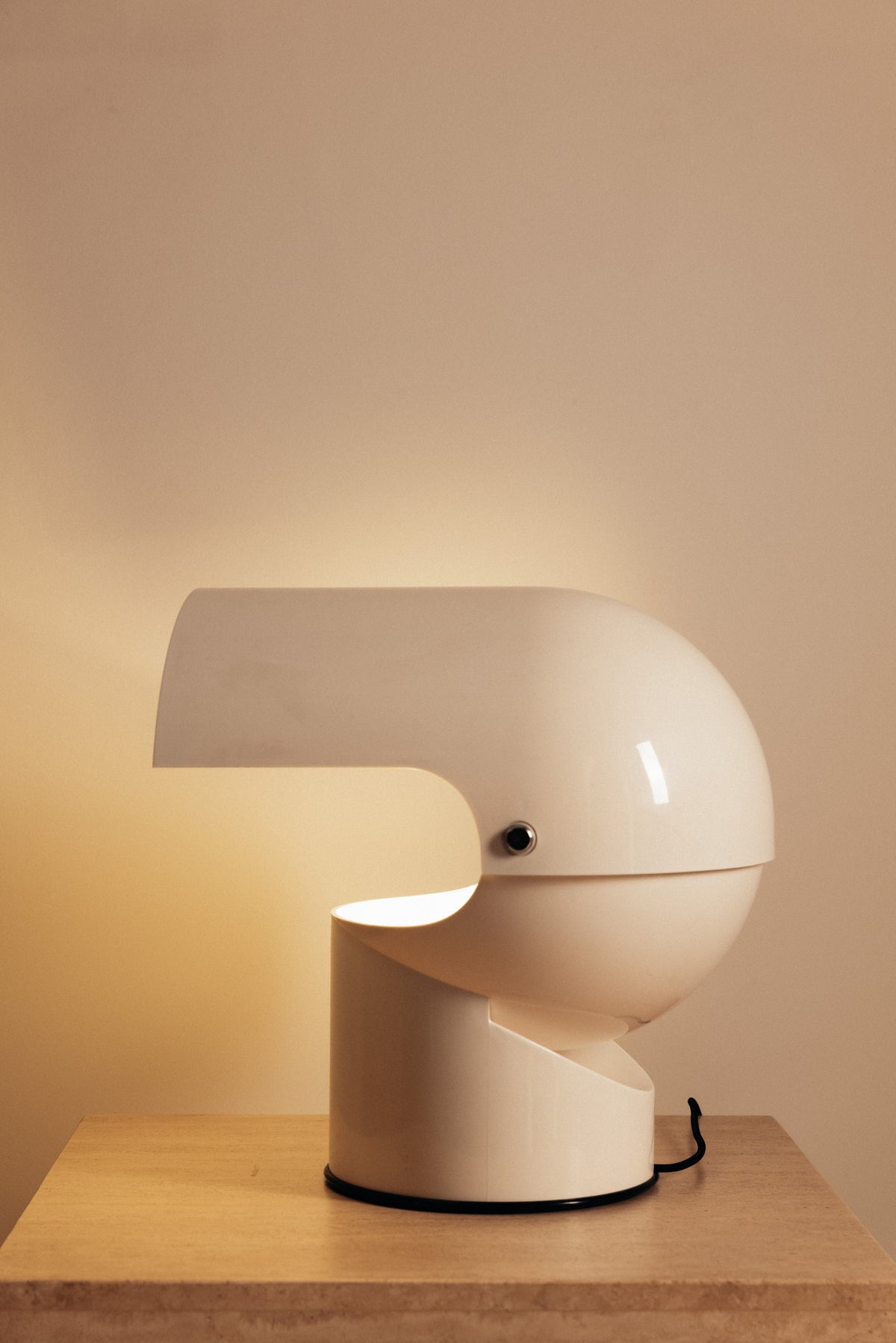 Gae Aulenti molded ABS Mezzo Pileo table lamp, side view with the hood raised open
