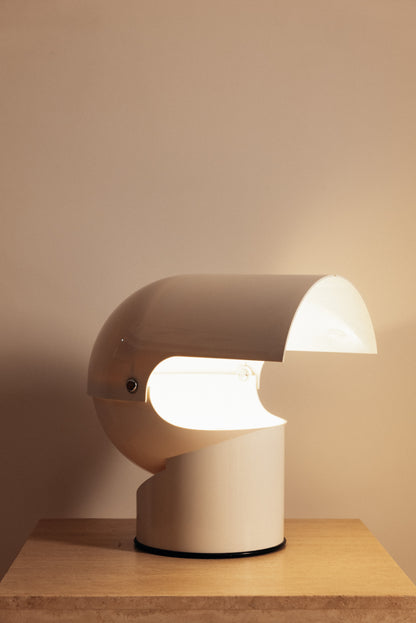 Gae Aulenti molded ABS Mezzo Pileo table lamp, hood open with the light visible inside