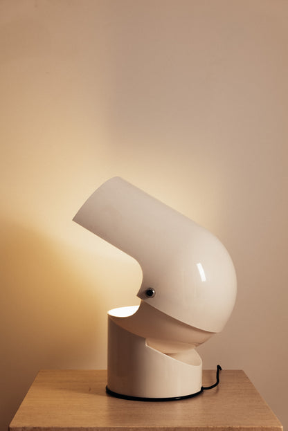 Gae Aulenti molded ABS Mezzo Pileo table lamp, hood tilted back on the cylindrical base