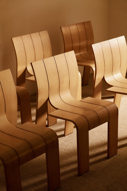 Set of 6 Gijs Bakker blonde pine chairs, close view of the chairs in a row